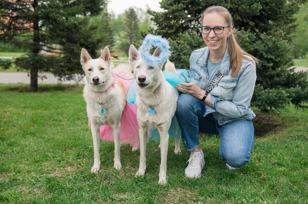 Happy,Woman,Walking,With,Two,Can,De,Palleiro,Dog,In